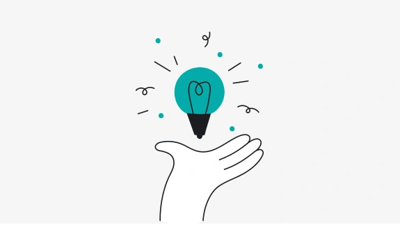 Line drawing of hand holding a lightbulb