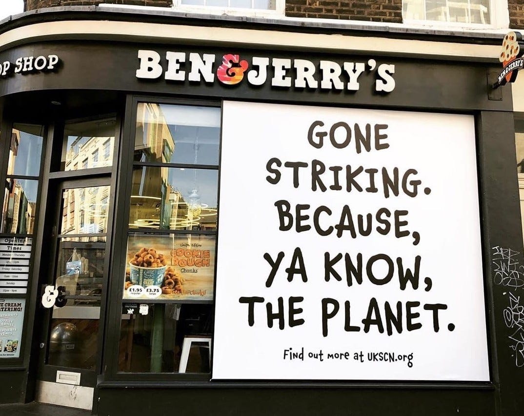 1_XcYgz0tweiGP-k0S85j-dQ Ben and Jerrys Store window with sign "Sorry gone striking, because ya know the planet"